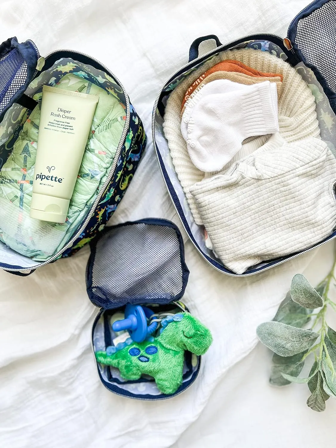 Itzy Ritzy Packing Cubes For Travel  Set of 3 Packing Cubes or Travel Organizers; Each Travel Cube Features a Mesh Top, Double Zippers and a Fabric Handle (Blue Dinosaurs)